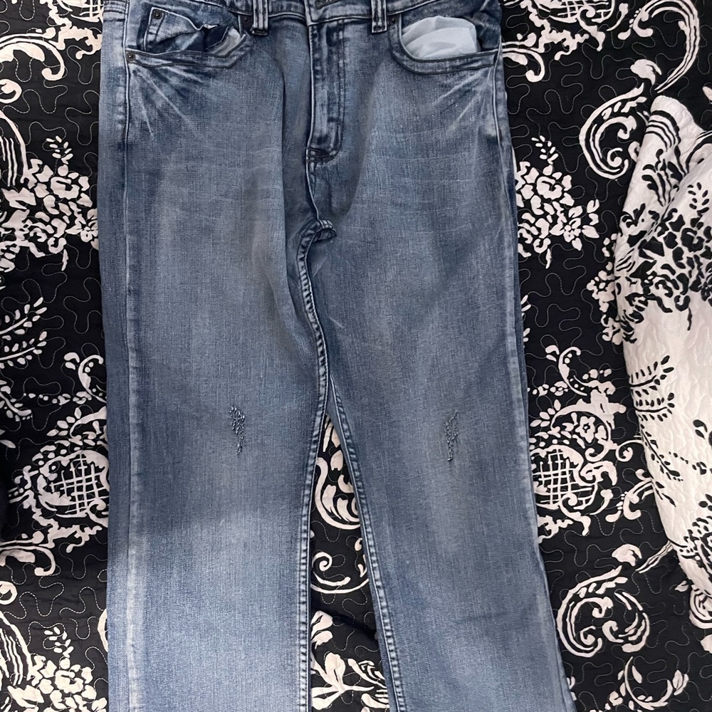 Light Blue Bootcut Jeans with High Waist and Faded Wash